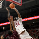 Richmond scores 23 points to lead No. 20 Arkansas past Texas A&M 99-84