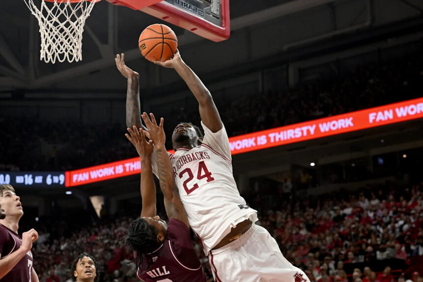 Richmond scores 23 points to lead No. 20 Arkansas past Texas A&M 99-84