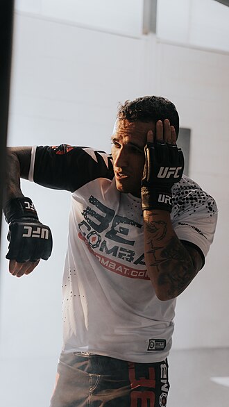 Charles Oliveira stuns Max Holloway at UFC 326