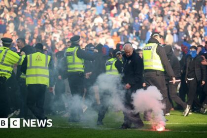 'Shameful' pitch invasion by Celtic and Rangers fans condemned by police