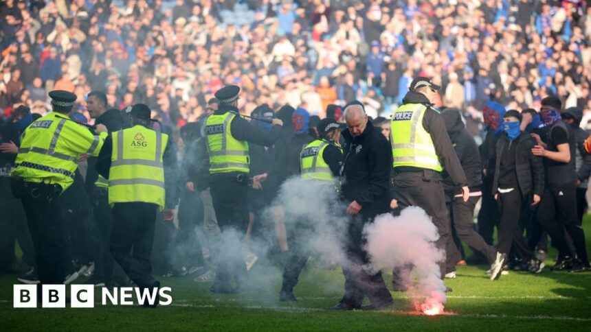 'Shameful' pitch invasion by Celtic and Rangers fans condemned by police