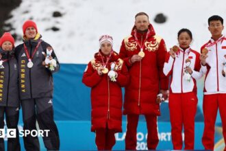 Germans protest against Russia on Paralympic podium