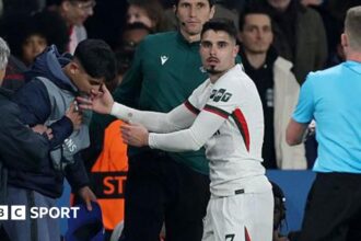 Chelsea's Neto apologises for pushing over ball boy