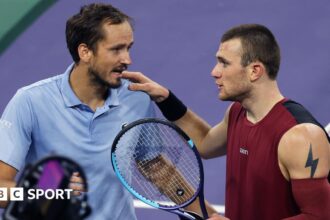 Draper beaten after controversial hindrance call