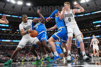 UCLA star Bilodeau exits win over Michigan State with leg injury