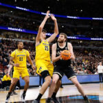 Cluff and Kaufman-Renn power No. 18 Purdue past No. 3 Michigan 80-72 in Big Ten final