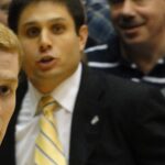 Charlotte hires former Cincinnati coach Wes Miller