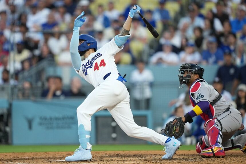 Dodgers open latest title defense with rout of D-backs