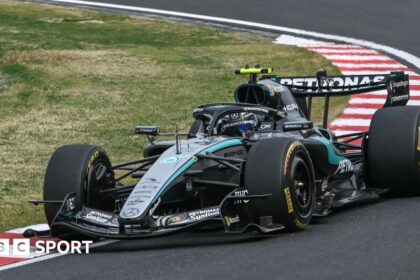 Antonelli wins to become youngest title leader