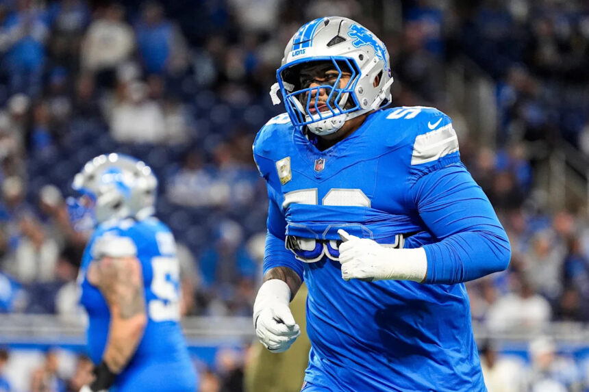 Lions' Dan Campbell: I'd like to move Penei Sewell to LT this fall