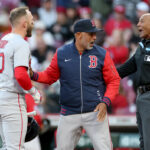 Umpire C.B. Bucknor hit by foul ball, forced to exit game