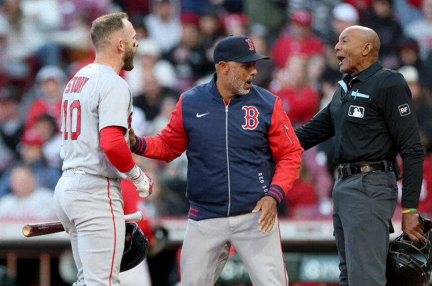 Umpire C.B. Bucknor hit by foul ball, forced to exit game