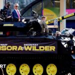 Chisora arrives to Wilder event in tank with Farage