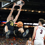 Is Michigan favored to win national championship against UConn?