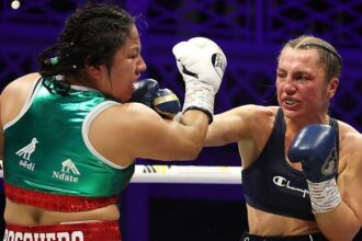 Scotney becomes Britain's youngest undisputed champion