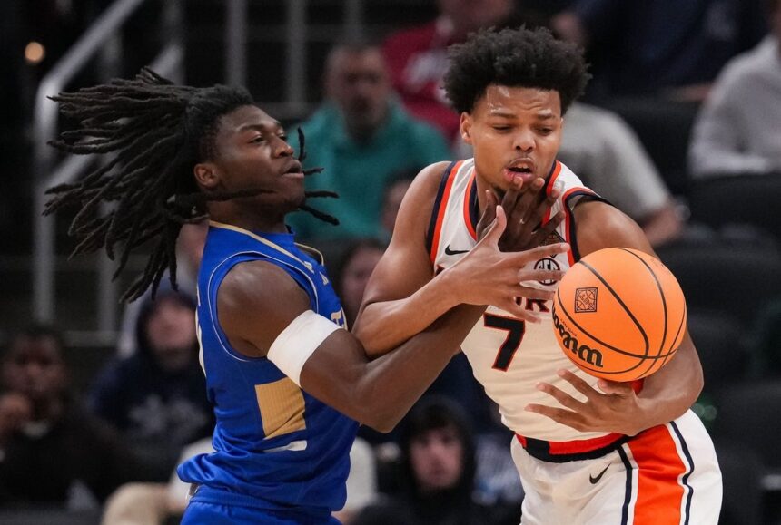 Auburn blows 21-point lead, recovers to beat Tulsa for NIT title