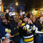 Watch Michigan fans rush Ann Arbor streets after national title win