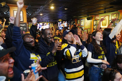 Watch Michigan fans rush Ann Arbor streets after national title win