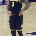 Elliot Cadeau, Michigan hold off UConn for national title