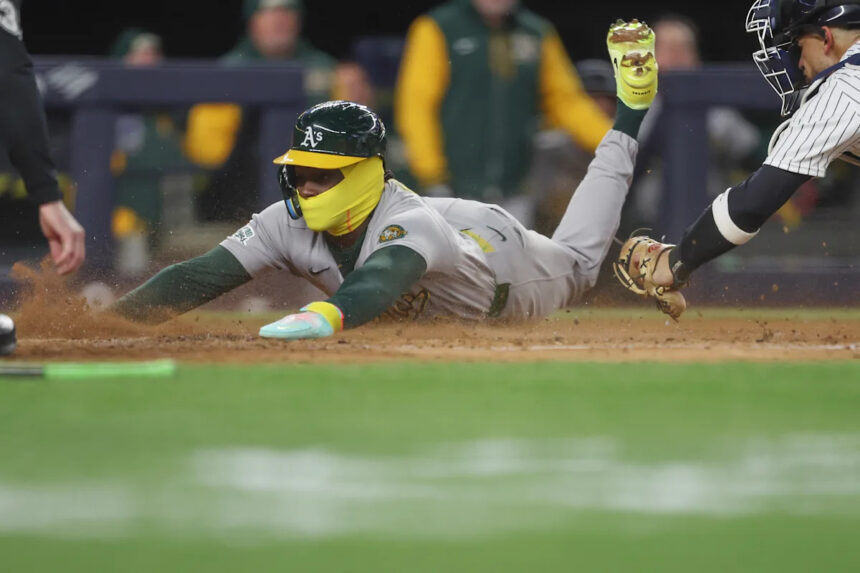 Rooker's 9th-inning sacrifice fly lifts Athletics over Yankees 3-2