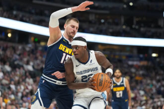 Jokic has his 34th triple-double, Nuggets beat the Grizzlies 136-119 for 10th straight win