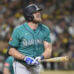 Padres rally with 5 runs in 9th to beat Mariners, extend win streak