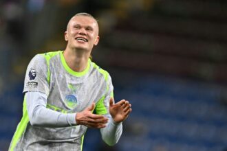 Manchester City go top of Premier League as Burnley relegated