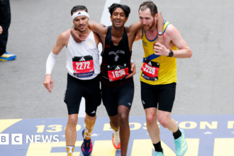 'Greatest feeling ever': Runners help exhausted man finish Boston Marathon
