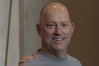 Louisville, Brohm reach 8-year, $64.8M extension