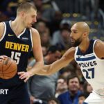 Jokic's triple-double draws Denver into contention