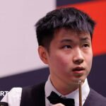 Zhao lets early lead slip as Murphy fights back