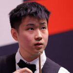 Zhao fights back to tie Murphy heading into final session