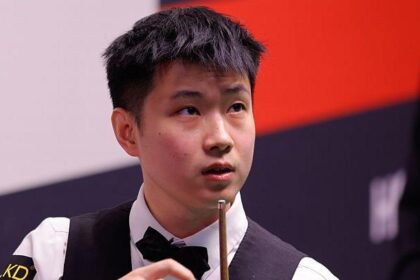 Zhao fights back to tie Murphy heading into final session