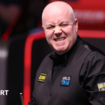 Higgins battles to level semi-final with Murphy