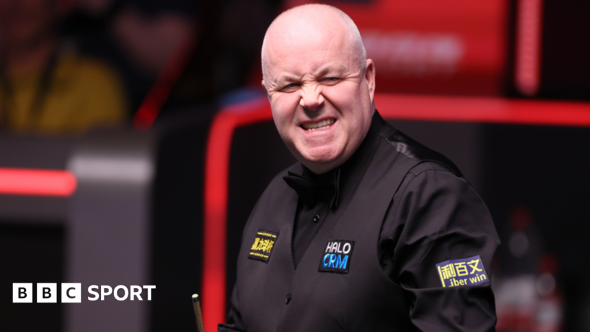 Higgins battles to level semi-final with Murphy