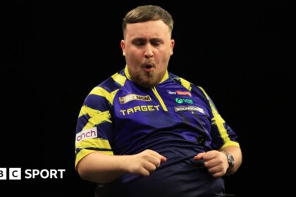 Littler beats Humphries for record-equalling win