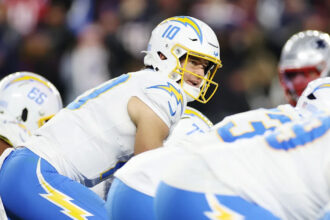 Mike McDaniel hopes to get QB Justin Herbert to "own the position" in a way he never has