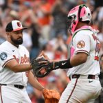 Orioles spin 4-hitter to salvage finale against A's