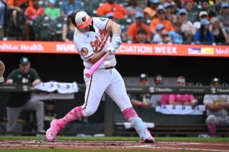 Orioles pitch well, drop Athletics to salvage finale of set