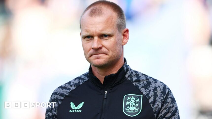 Huddersfield boss Manning leaves League One club after compassionate leave