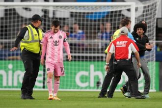 Security shields Lionel Messi from fan during FC Cincinnati-Miami game